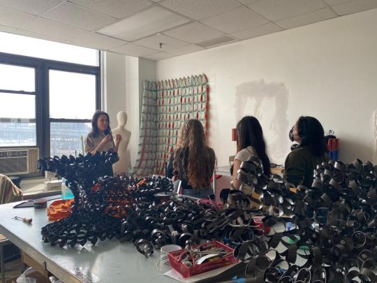 MFTA artist in residence Kate Rusek offering our students a tour of her on-site studio where she makes work with discarded materials donated to MFTA. 