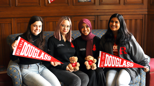 Students with Douglass Banners and Teddy Bears
