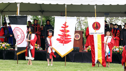 Douglass grads and flags on field