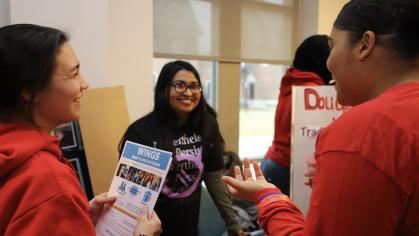 Students talk at a DEI event