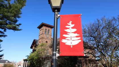 College hall and red pine banner