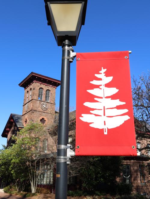 College hall and red pine banner
