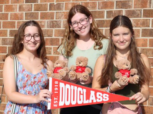 Students hold a Douglass banner at Welcome Days 