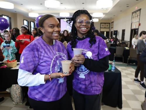 Students hold boba at event