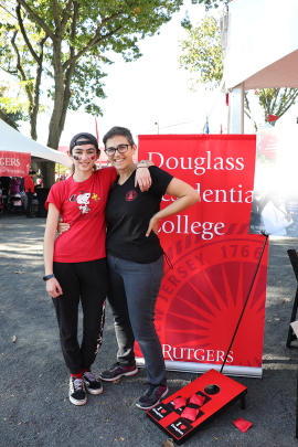 Alumna at tent