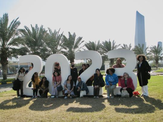 Douglass Global Leaders in front of 2023 sign