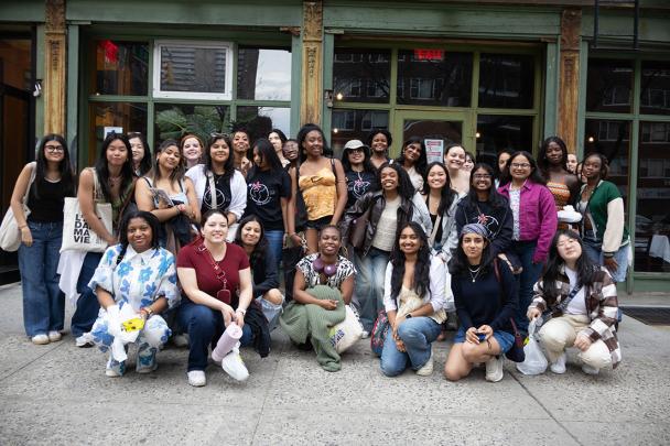 Students pose for picture outside