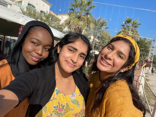 Students take selfie outside