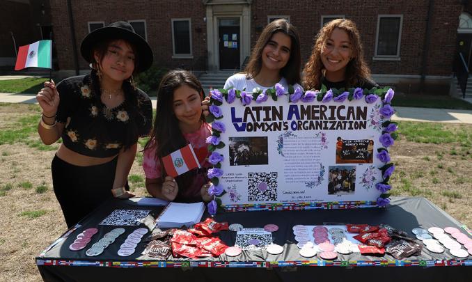 students at Latin American Women's Organization table